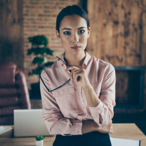Portrait of her she nice-looking attractive stylish trendy content smart clever intelligent lady shark ceo boss chief at modern industrial loft interior style work place station indoors